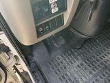 a car dashboard with a control panel in the center