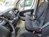 a picture of a van that is parked in a lot