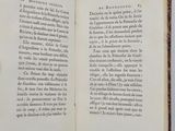 someone is holding a book open to a page with a picture on it