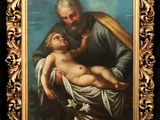 un tableau représentant un homme tenant un enfant dans ses bras