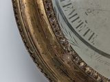 a clock that is on the wall in the room