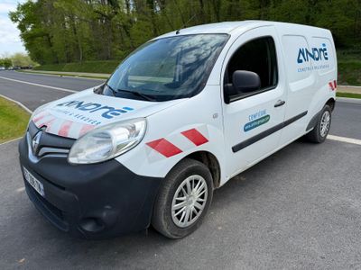 a van that is parked on the side of the road