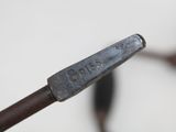 a close up of a pair of scissors on a table