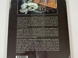the back cover of a book with a picture of a man standing in front of a piano