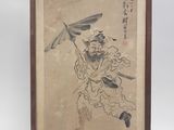 une ancienne peinture chinoise représentant un homme avec un dragon sur le dos