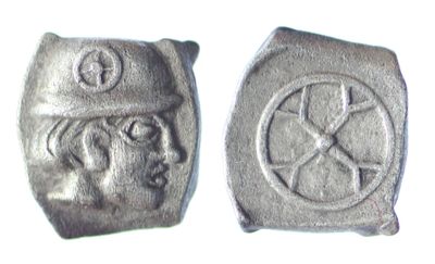 une image représentant une paire de pièces d'argent sur lesquelles figure le visage d'un homme