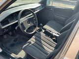 a picture of the interior of a car with a steering wheel and dashboard