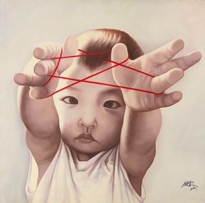 un tableau représentant un bébé tenant un fil rouge au-dessus de sa tête