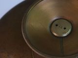 a close up of a metal object on a table