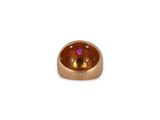 an image of a gold ring with a pink stone in the center