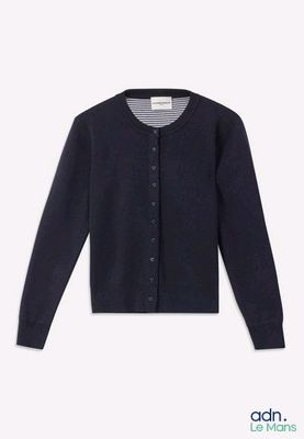 a close up of a black cardigan sweater on a white background