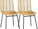 pair of rattan dining chairs with black metal legs