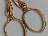 a pair of scissors that are on a table