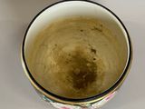 a bowl with a brown substance in it on a table