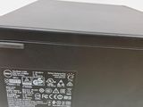 a close up of a black box on a white surface