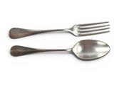 two spoons and a fork on a white surface