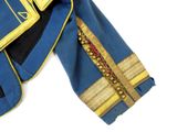 a blue jacket with gold trims and a yellow belt