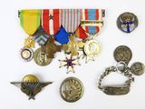 a lot of medals on a white surface