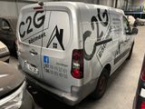 a van that is parked in a parking lot