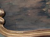 a gold frame with a picture of a cat on it