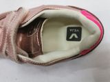 a close up of a pair of shoes on a white surface