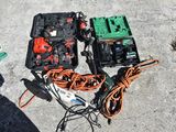 a lot of tools that are laying out on the ground