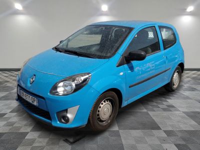 a picture of a blue car parked on a checkered floor