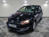 a picture of a black vw golf in a showroom