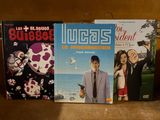 three books that are sitting on a shelf