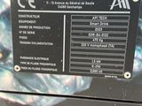 a sign on the side of a machine that says aptech bas
