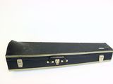 a black suitcase that is sitting on a white surface