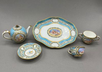 an image of a tea set with a cup and saucer