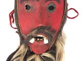 an image of a red mask with long hair