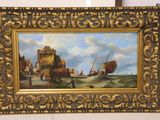 une image d'un tableau sur le mur d'une pièce