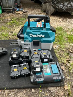 many makita power tools on the ground