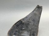 a small piece of leather that is on a table