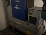 a machine that is sitting in the corner of a room
