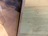 a picture of a cell phone sitting on a table