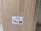 a cardboard box with a sticker on it sitting on a shelf