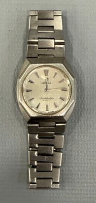 an image of a close up of a wrist watch on a table