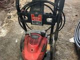 an image of a power washer in a garage