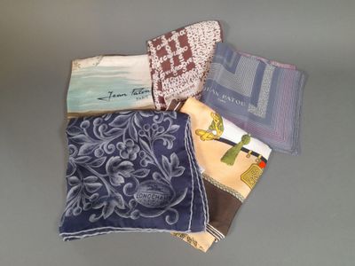 five different types of handkerchiefs laid out on a table