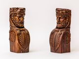 pair of carved wooden busts of two men with beards