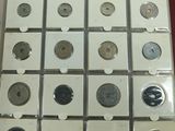 a box of coins that are sitting on a table