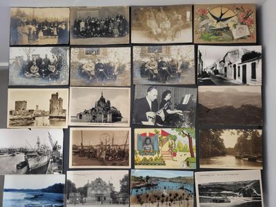 an old photo of a bunch of old photos hanging on a wall