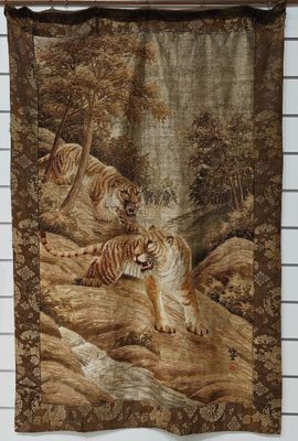 tapestry of two tigers in a wooded area with a waterfall in the background