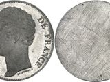 a close up of a coin with a woman ' s head on it