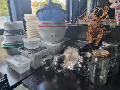a table with a bunch of plates and bowls on it
