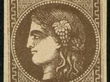a brown stamp with a woman ' s face on it
