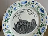 two plates that are sitting on top of each other
